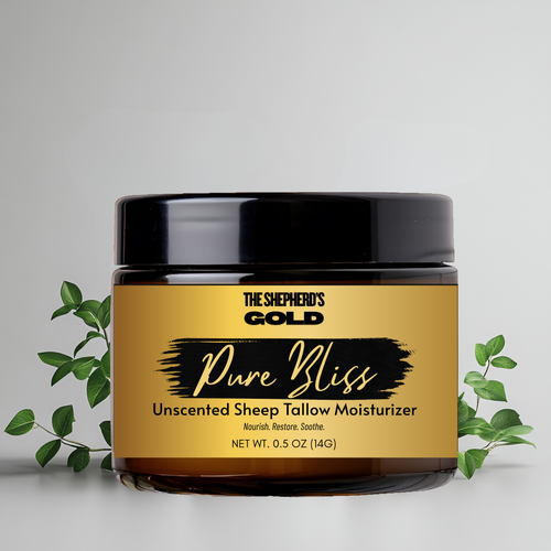 Jar of The Shepherd's Gold Pure Bliss Unscented Sheep Tallow Moisturizer on a light gray background with green leaves.